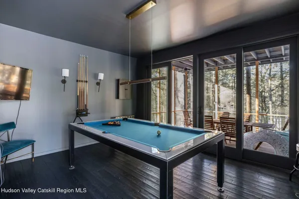 a living room with hard wood floor