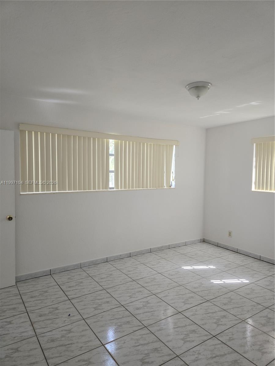 7840 Southwest 23rd Street Miami, FL 33155 - Photo 8 of 15 Master Bedroom