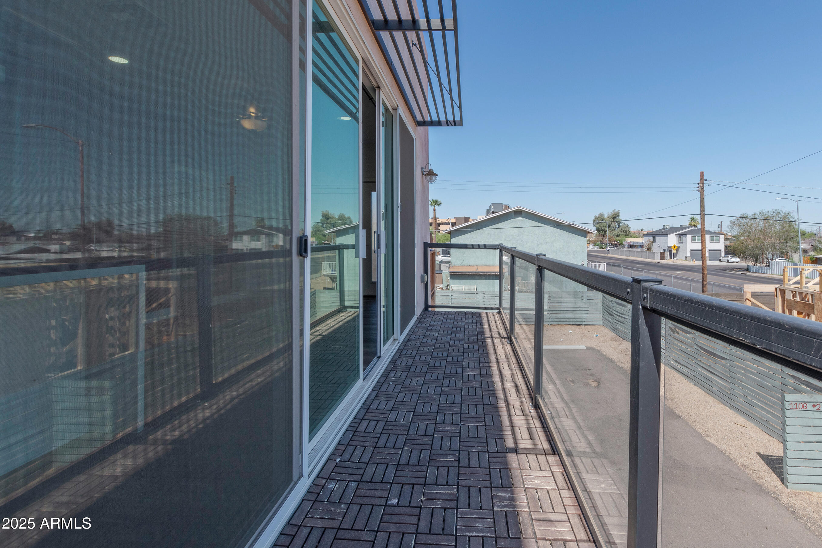 1106 South Montezuma Avenue Phoenix, AZ 85003 - Photo 8 of 15 a view of a balcony with furniture and shower