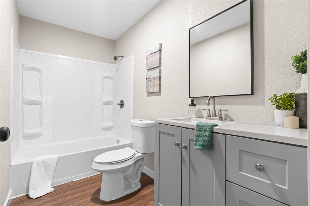 175 Hcr-4434 Itasca, TX 76055 - Photo 20 of 30 a bathroom with a sink a toilet and shower