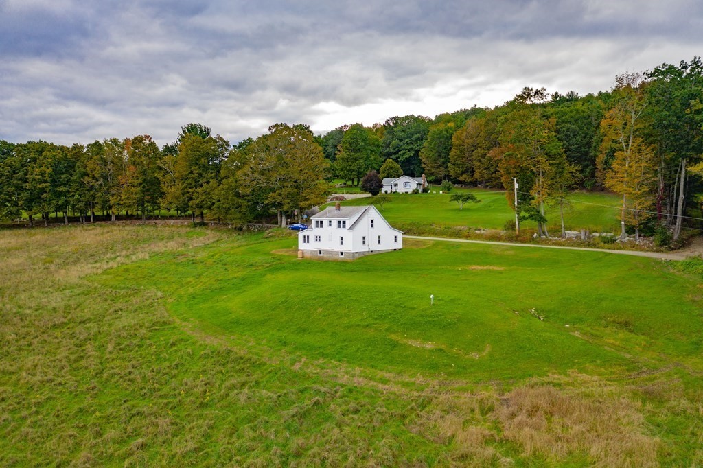 82 Lyman Road Chester, MA 01011 - Photo 36 of 40 a view of a golf course with a garden