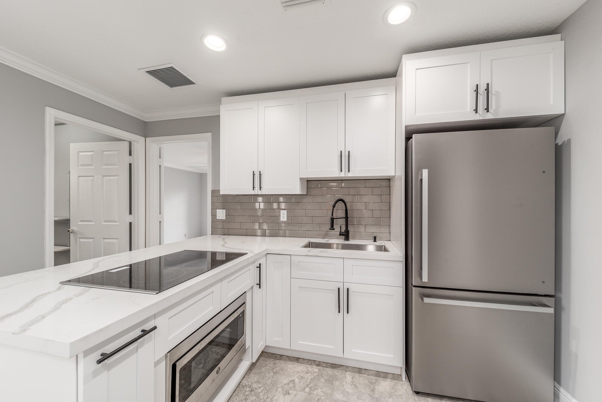 3989 Southwest Jarmer Road Port St. Lucie, FL 34953 - Photo 13 of 20 InLaw Kitchen
