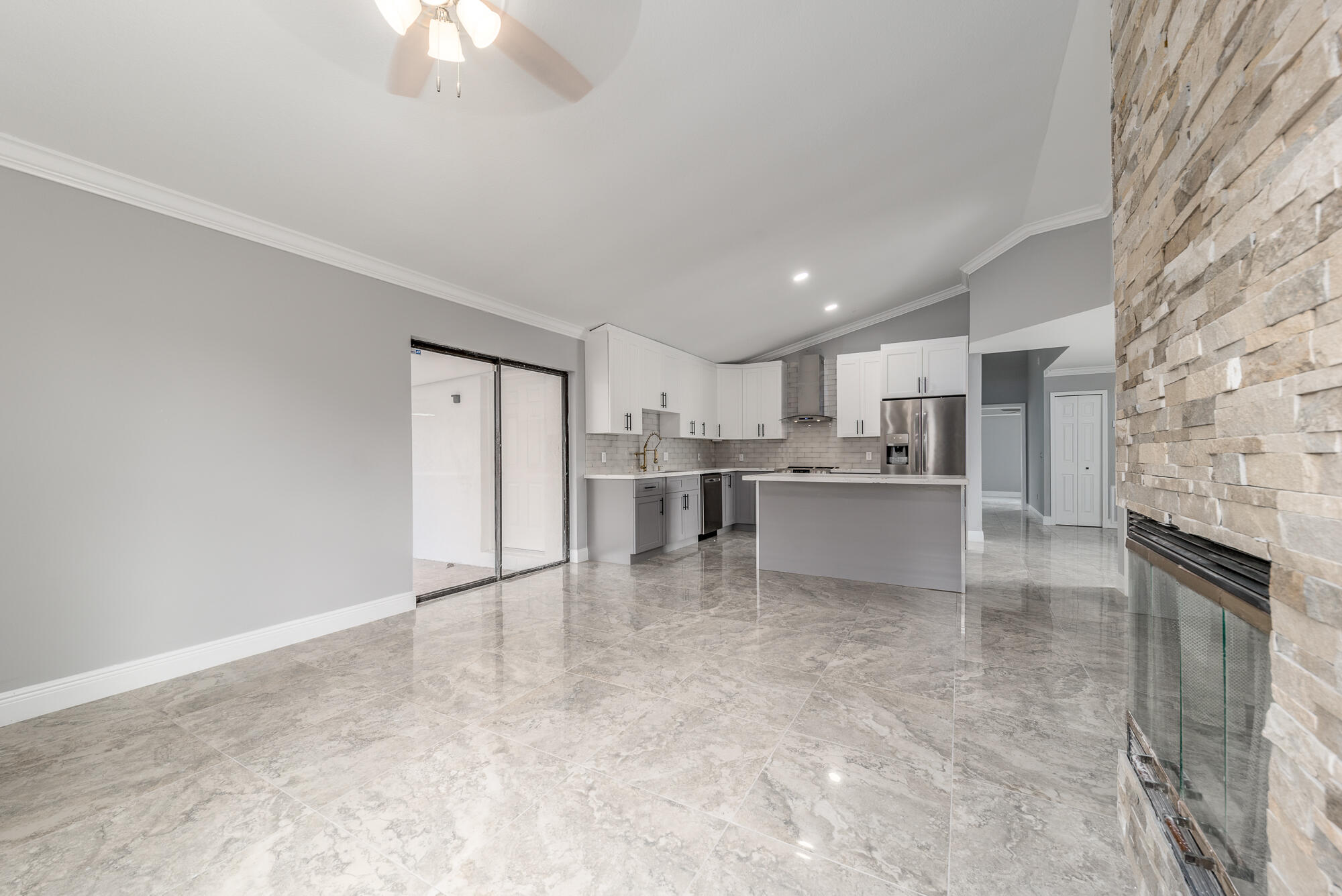 3989 Southwest Jarmer Road Port St. Lucie, FL 34953 - Photo 3 of 20 Kitchen & Living