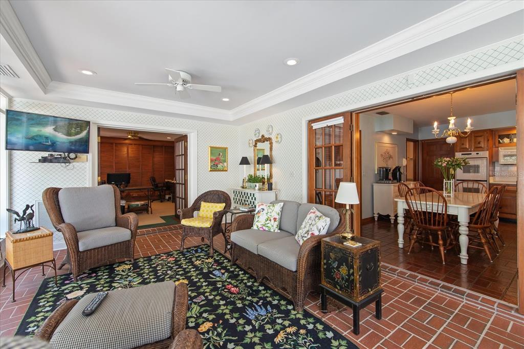 1506 South Sheridan Forest Drive Tampa, FL 33629 - Photo 14 of 41 a living room with furniture and a floor to ceiling window