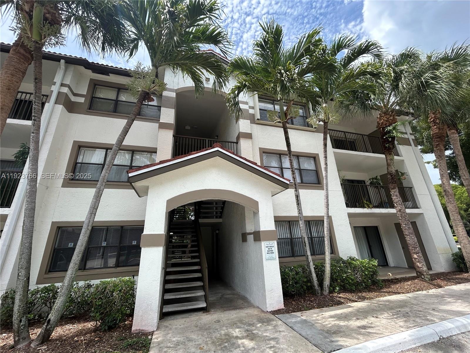 620 South Park Road, Unit 152 Hollywood, FL 33021 - Photo 10 of 14 a front view of a house with a yard