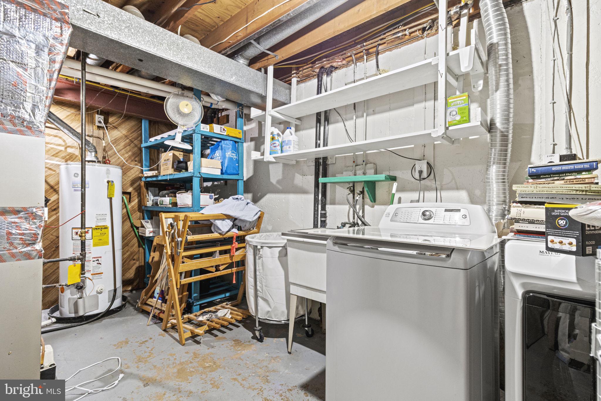 9712 Eldwick Way Potomac, MD 20854 - Photo 33 of 63 a utility room with dryer and washer