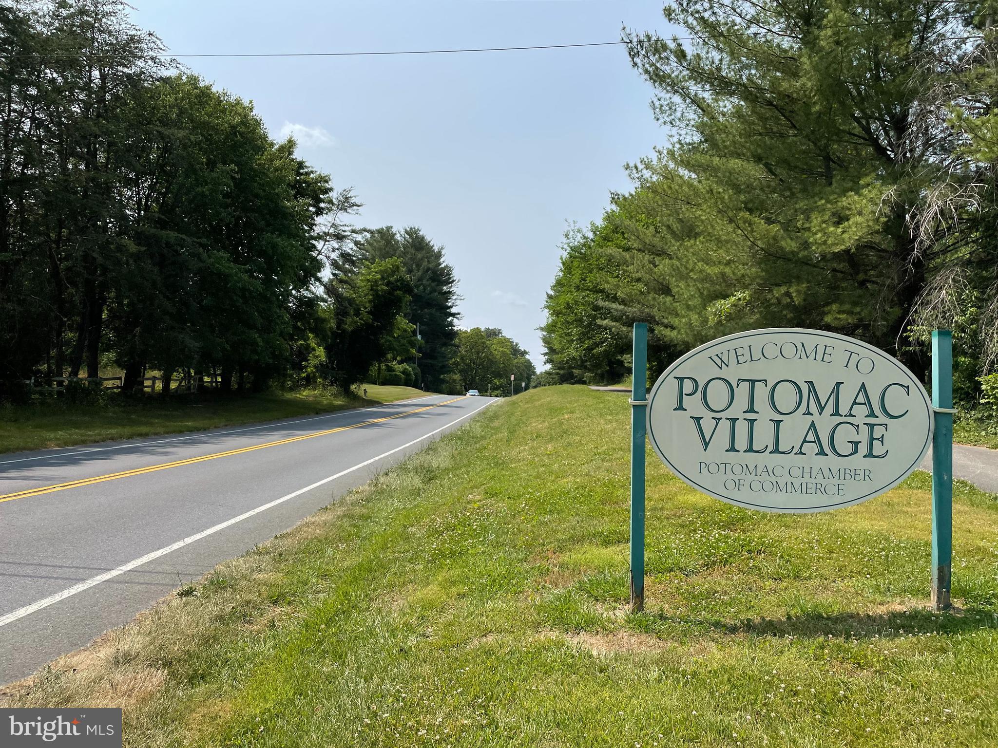 9712 Eldwick Way Potomac, MD 20854 - Photo 61 of 63 a view of a sign board with a yard