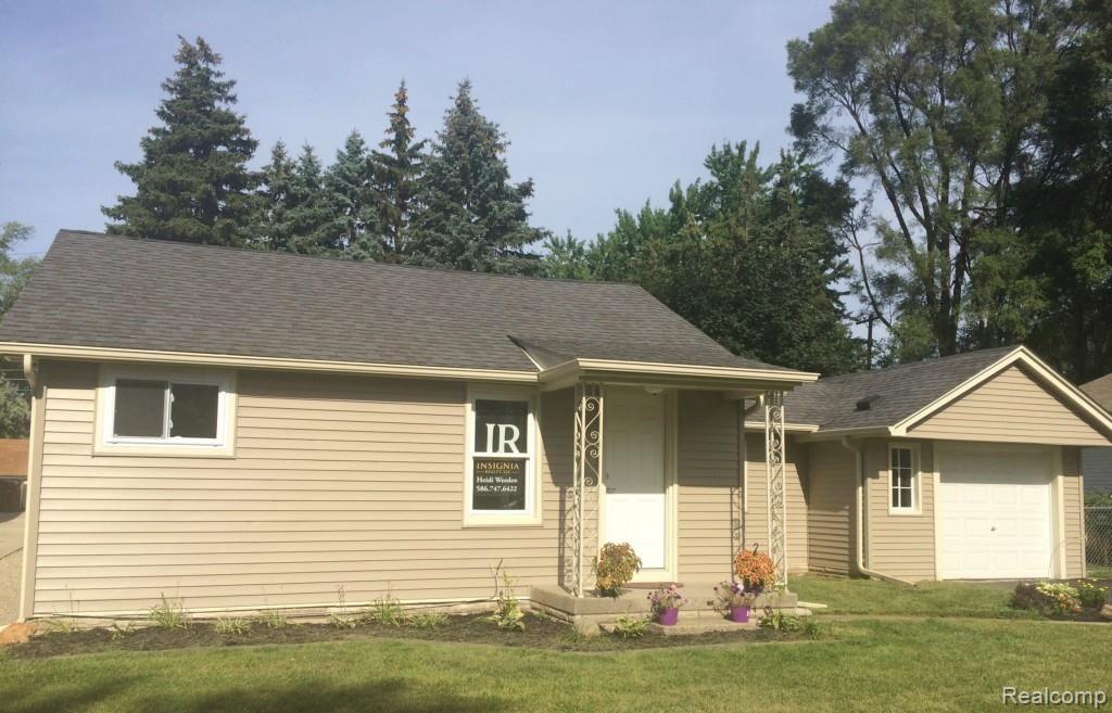 47435 Greenview Road Utica, MI 48317 - Photo 2 of 11 NEWLY VINYL SIDED AND NEW WINDOWS!