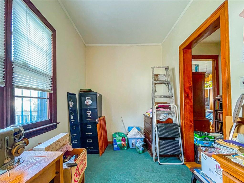 247 82nd Street Brooklyn, NY 11209 - Photo 12 of 48 a view of a bedroom with workspace and a window