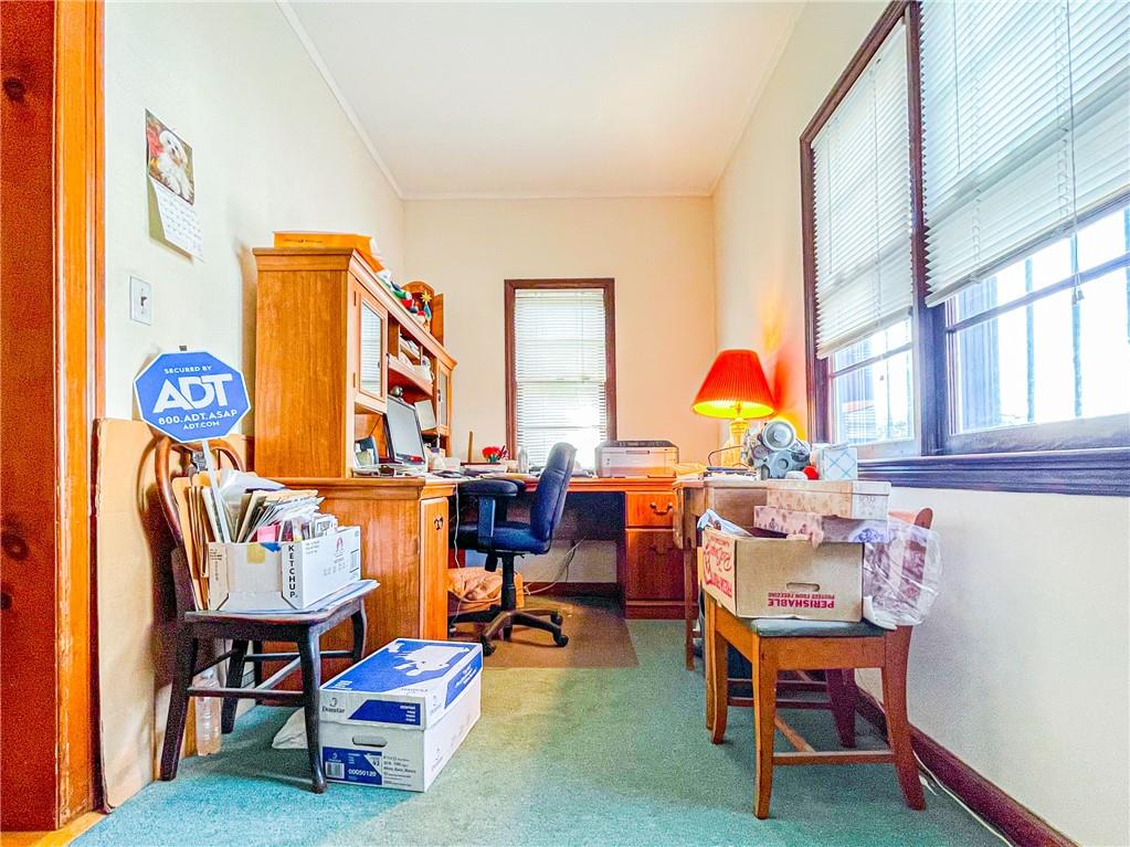 247 82nd Street Brooklyn, NY 11209 - Photo 13 of 48 a living room with furniture a rug and a window
