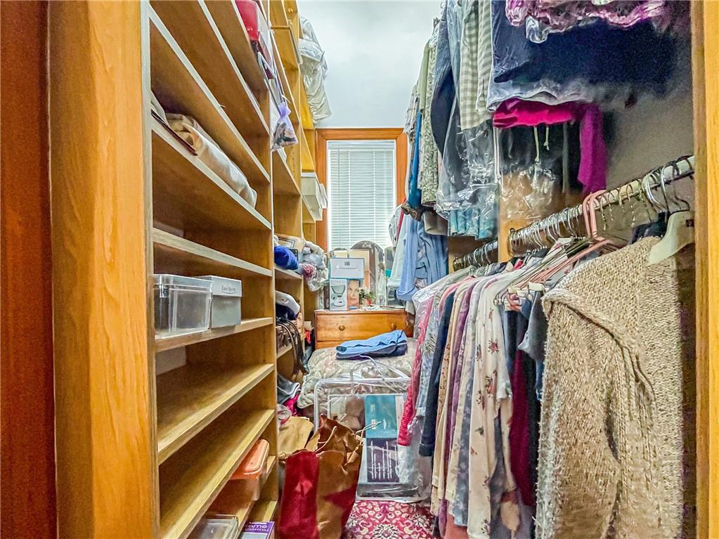 247 82nd Street Brooklyn, NY 11209 - Photo 15 of 48 a view of walk in closet with clothes