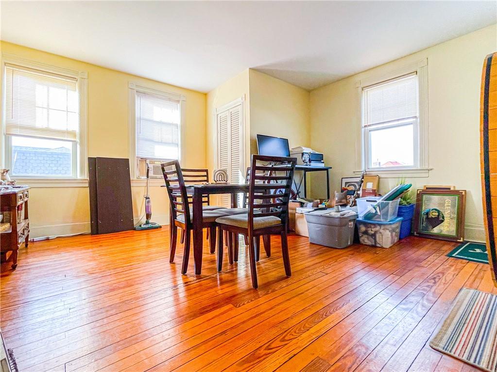 247 82nd Street Brooklyn, NY 11209 - Photo 28 of 48 a living room with furniture and a wooden floor