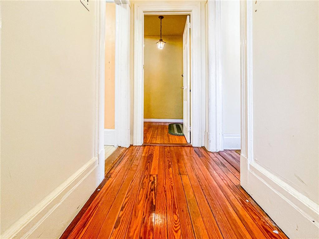 247 82nd Street Brooklyn, NY 11209 - Photo 33 of 48 a view of a room with wooden floor and door