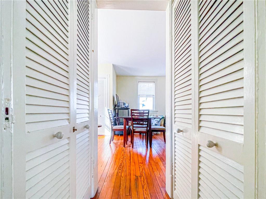 247 82nd Street Brooklyn, NY 11209 - Photo 37 of 48 a view of a living room with furniture and wooden floor