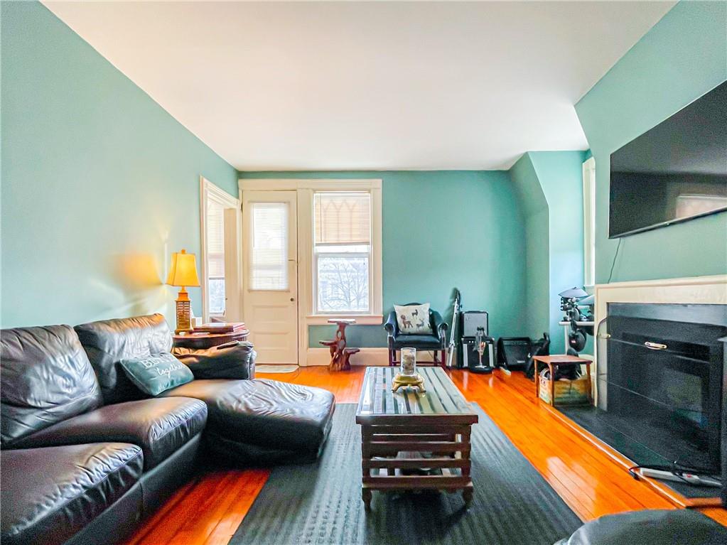 247 82nd Street Brooklyn, NY 11209 - Photo 41 of 48 a living room with furniture fireplace and window