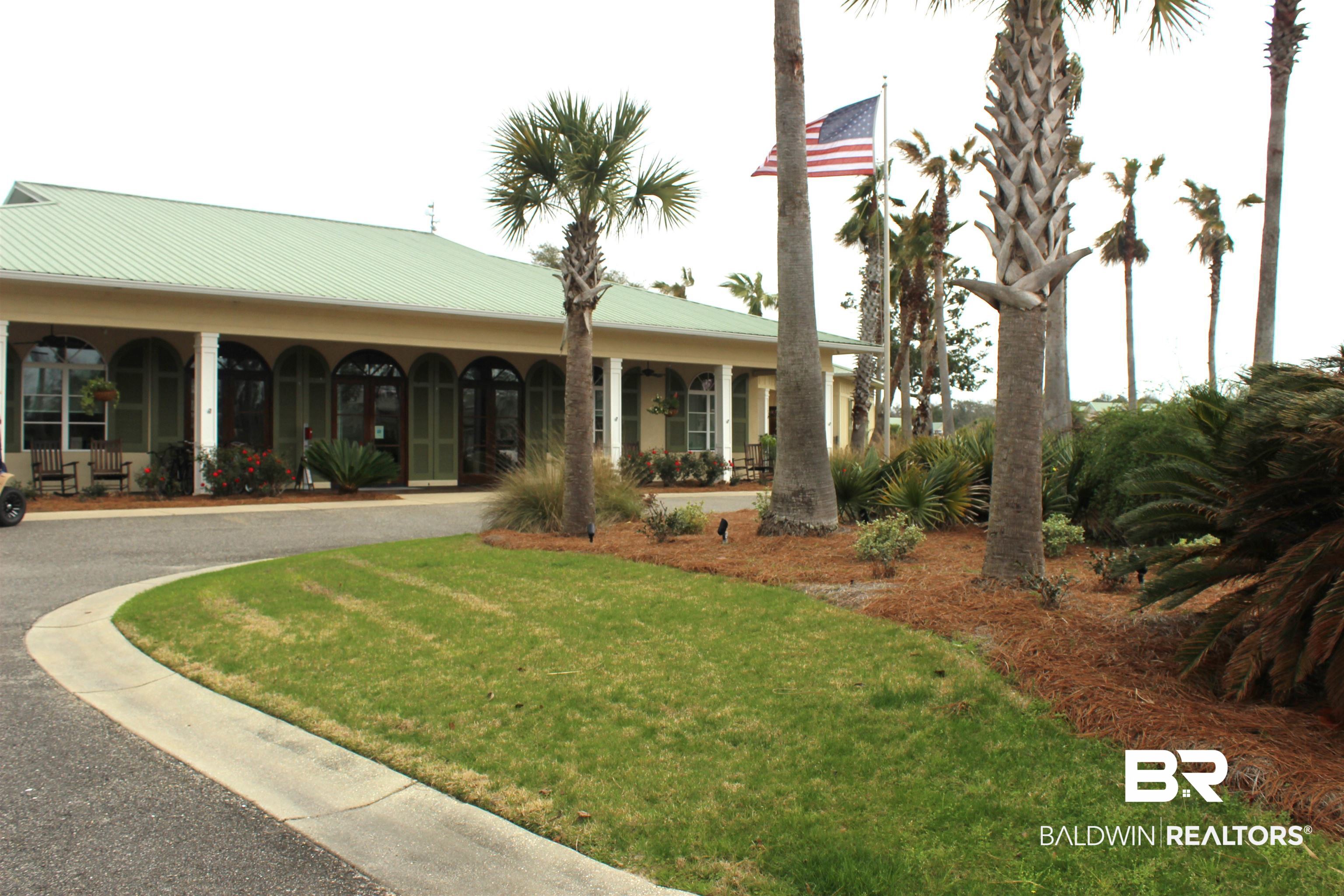 28085 Migratory Way Elberta, AL 36530 - Photo 11 of 59 Exterior space featuring a yard