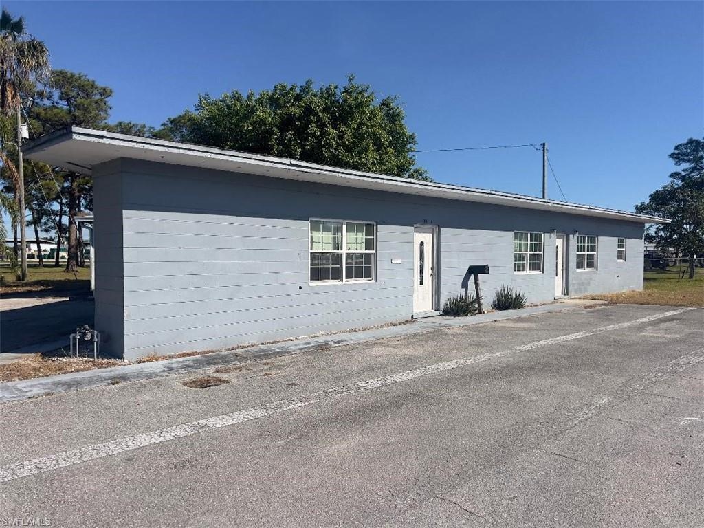a view of the house with a patio