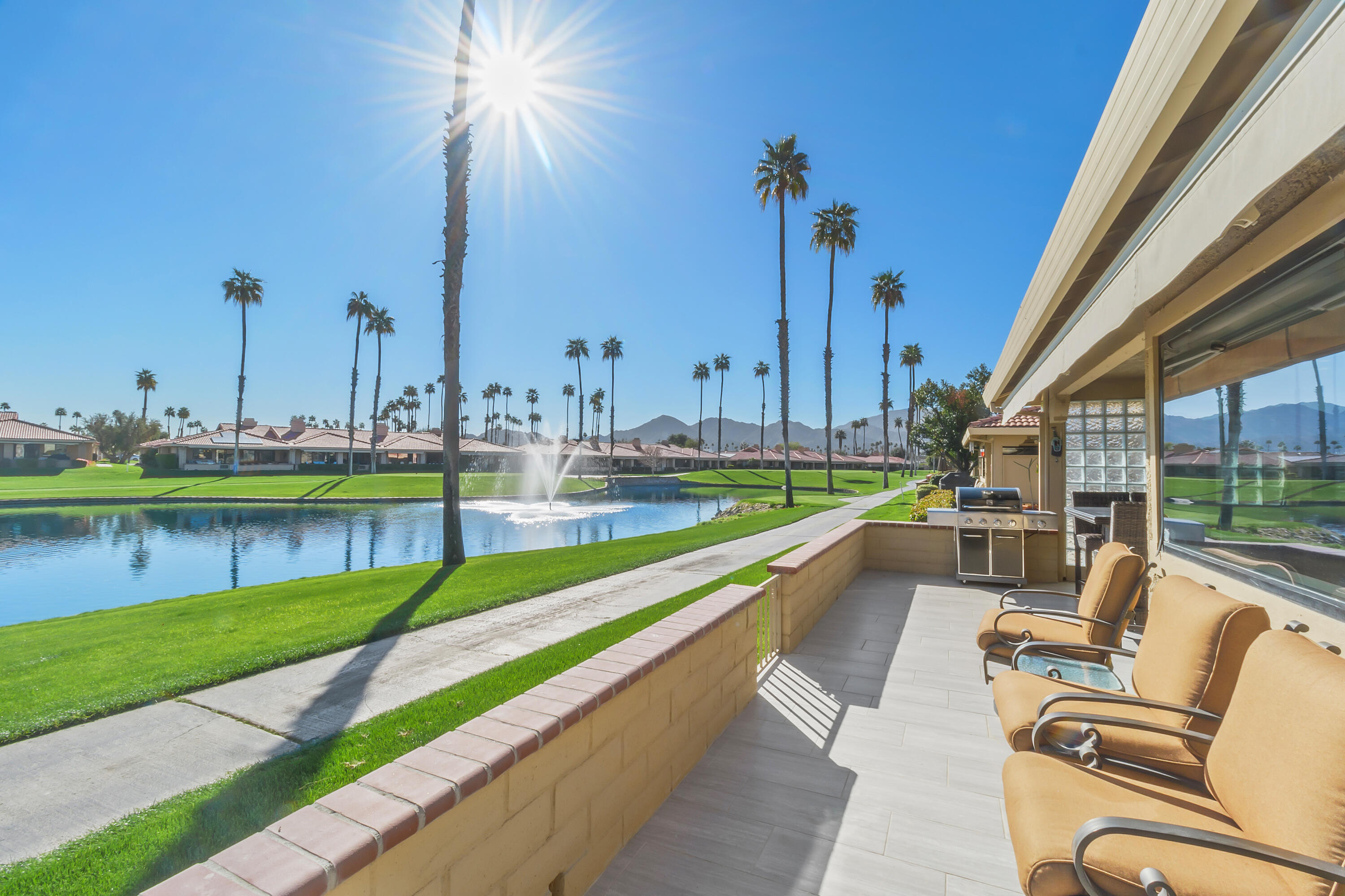 43 Conejo Circle Palm Desert, CA 92260 - Photo 15 of 58 a view of swimming pool with a lounge chairs