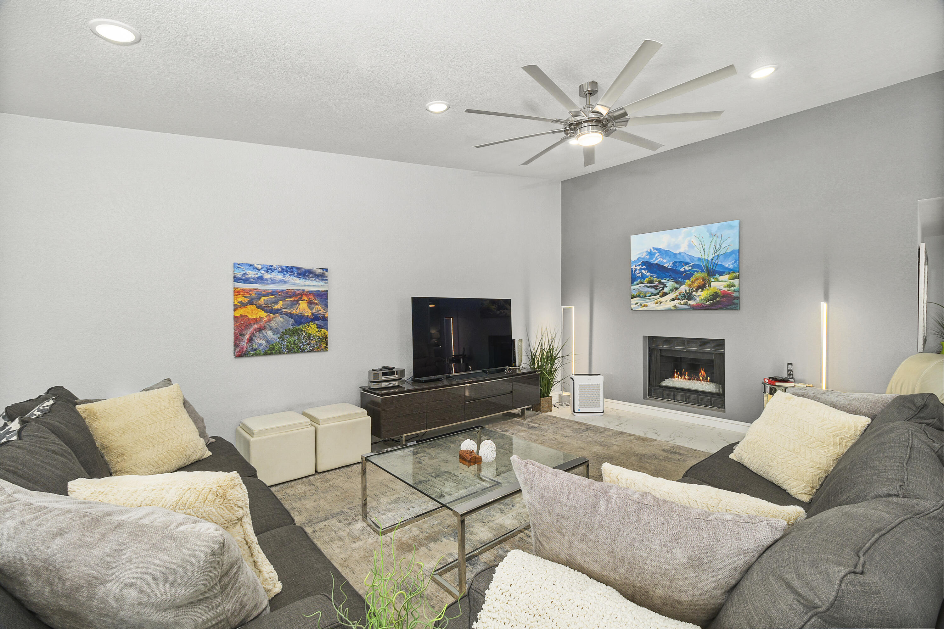 43 Conejo Circle Palm Desert, CA 92260 - Photo 9 of 58 a living room with furniture and a fireplace