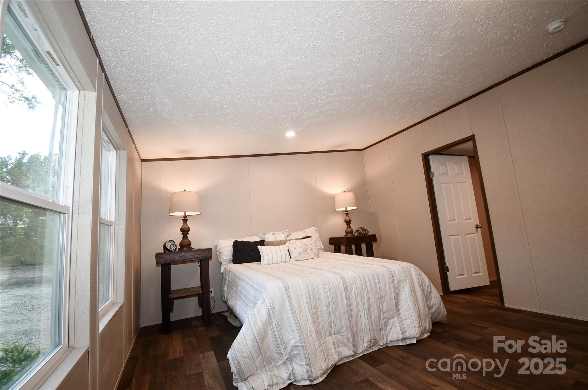 5339 Lockhart Road Kershaw, SC 29067 - Photo 17 of 28 a bedroom with a bed and a mirror