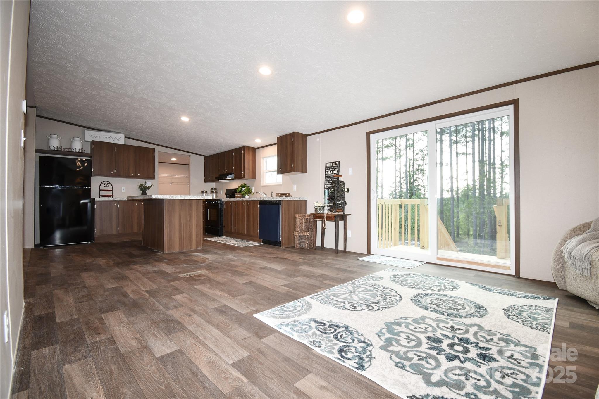 5339 Lockhart Road Kershaw, SC 29067 - Photo 9 of 28 a view of kitchen with furniture and refrigerator