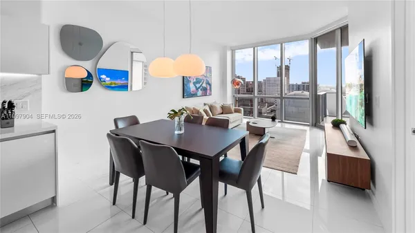 a view of a dining room and a table or chairs