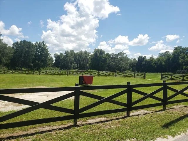 a view of a bench in a park