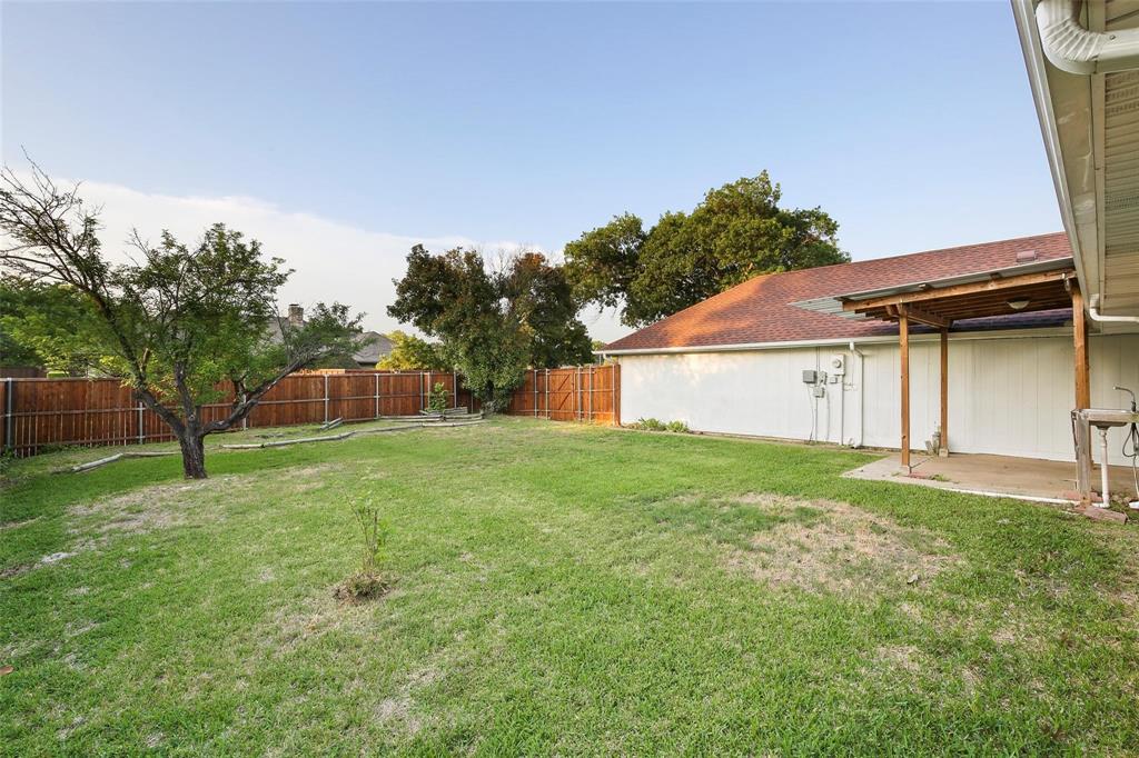 10135 Rita Road Dallas, TX 75243 - Photo 23 of 24 Fenced backyard featuring a patio