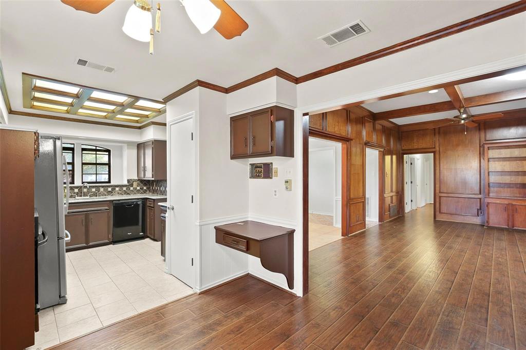 10135 Rita Road Dallas, TX 75243 - Photo 5 of 24 Kitchen with ceiling fan, ornamental molding, coffered ceiling, freestanding refrigerator, and dishwasher