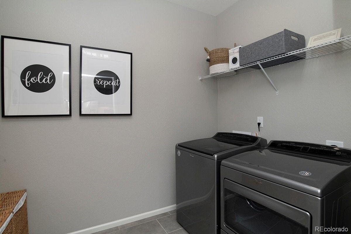 2199 Barela Drive Berthoud, CO 80513 - Photo 24 of 32 a utility room with dryer and washer