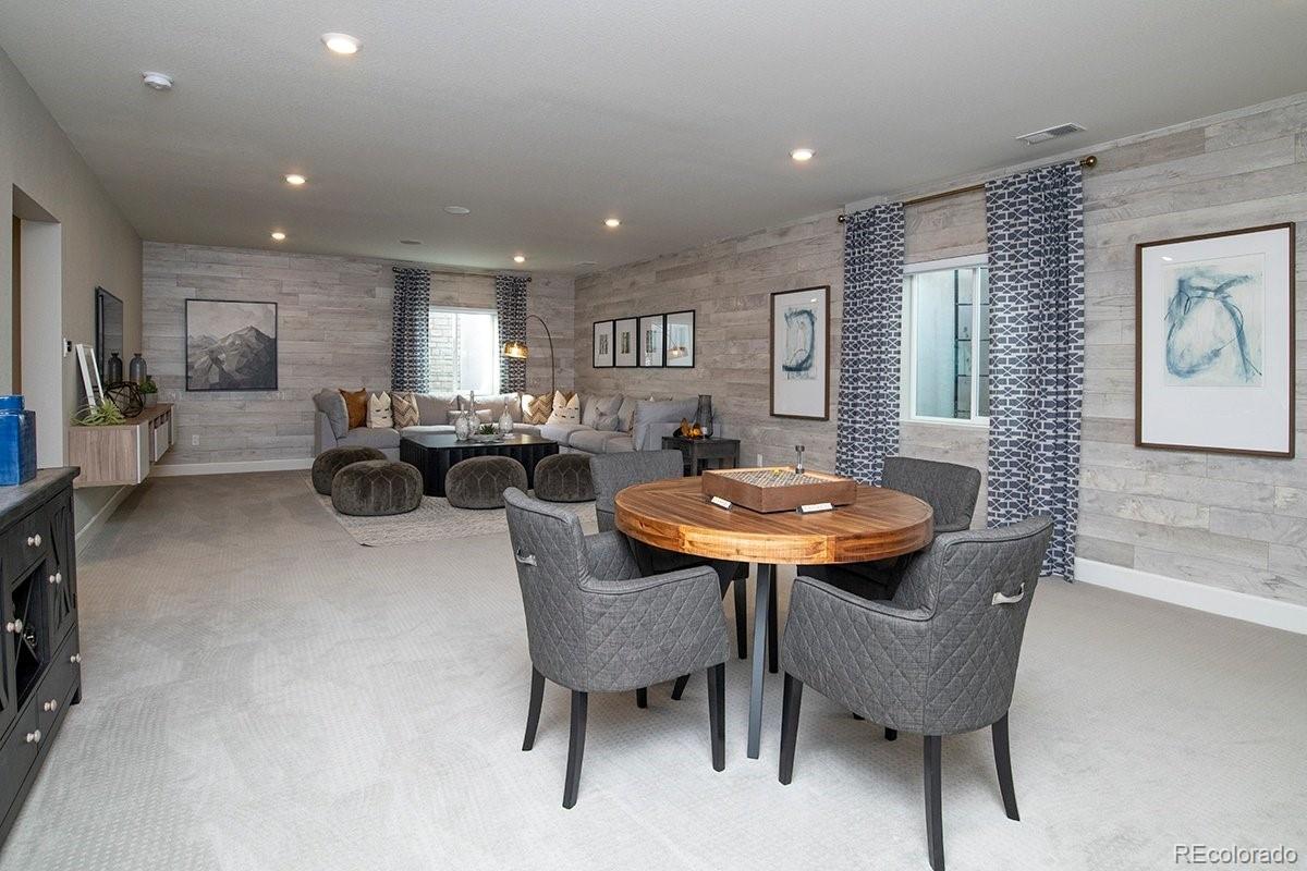 2199 Barela Drive Berthoud, CO 80513 - Photo 26 of 32 a view of a dining room with furniture