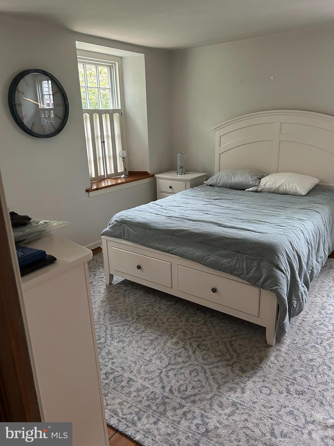 1521 Old Welsh Road Huntingdon Valley, PA 19006 - Photo 16 of 38 a bedroom with a bed and a window