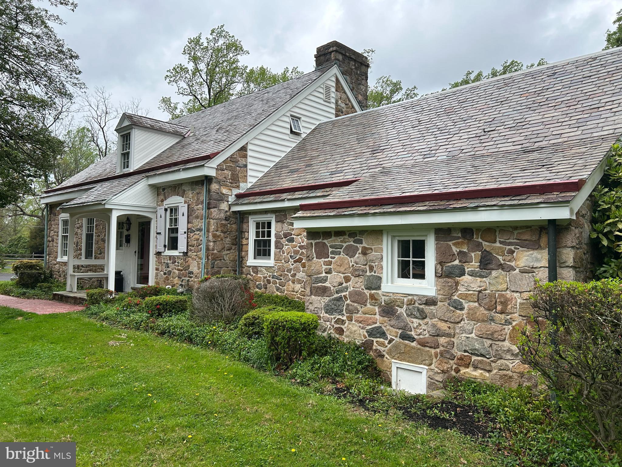 1521 Old Welsh Road Huntingdon Valley, PA 19006 - Photo 24 of 38 a front view of a house with garden