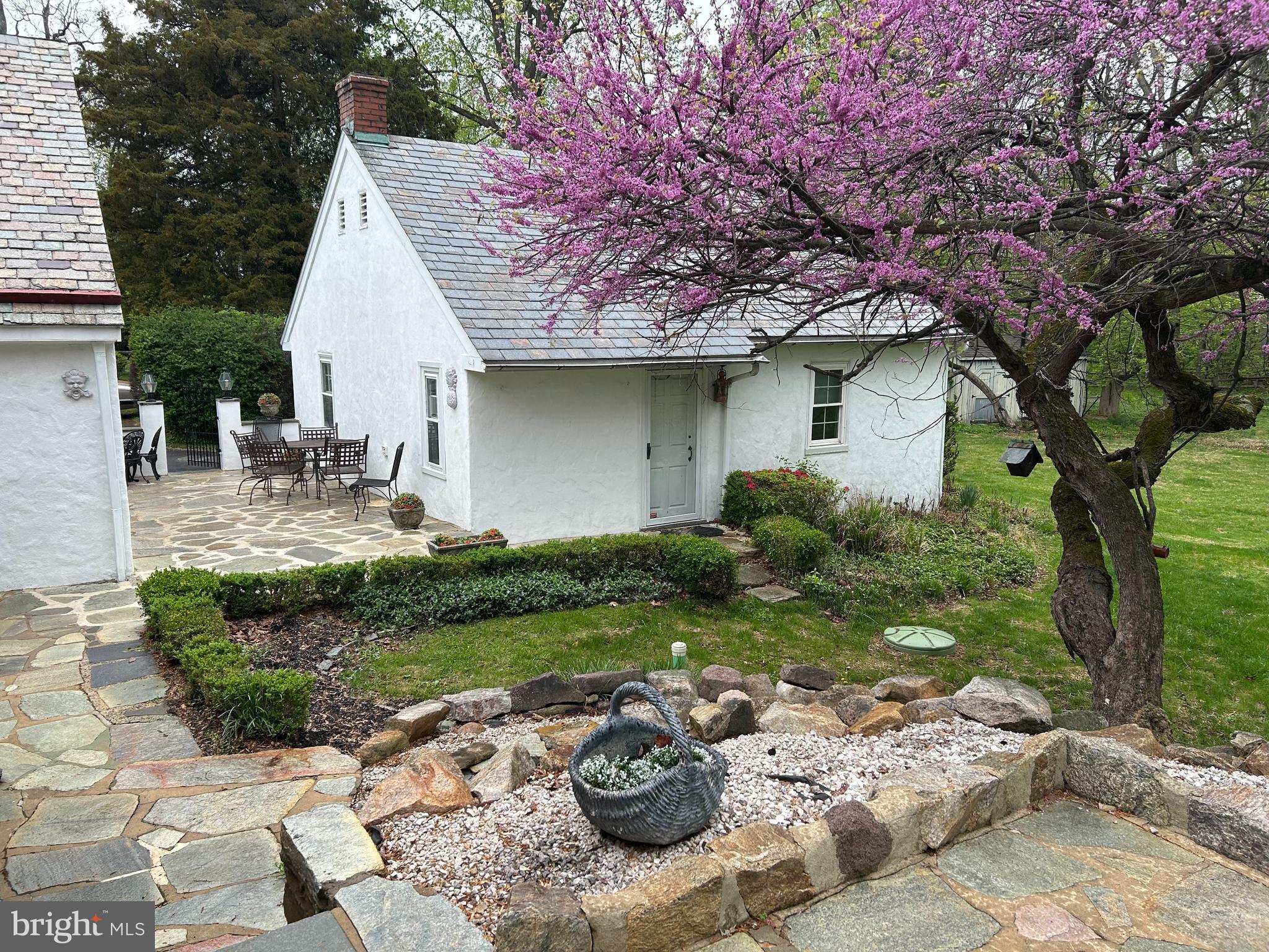 1521 Old Welsh Road Huntingdon Valley, PA 19006 - Photo 25 of 38 a front view of a house with garden