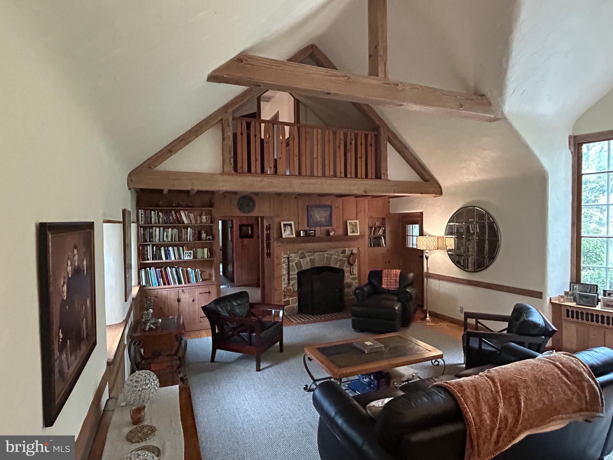 1521 Old Welsh Road Huntingdon Valley, PA 19006 - Photo 29 of 38 a living room with furniture and a fireplace