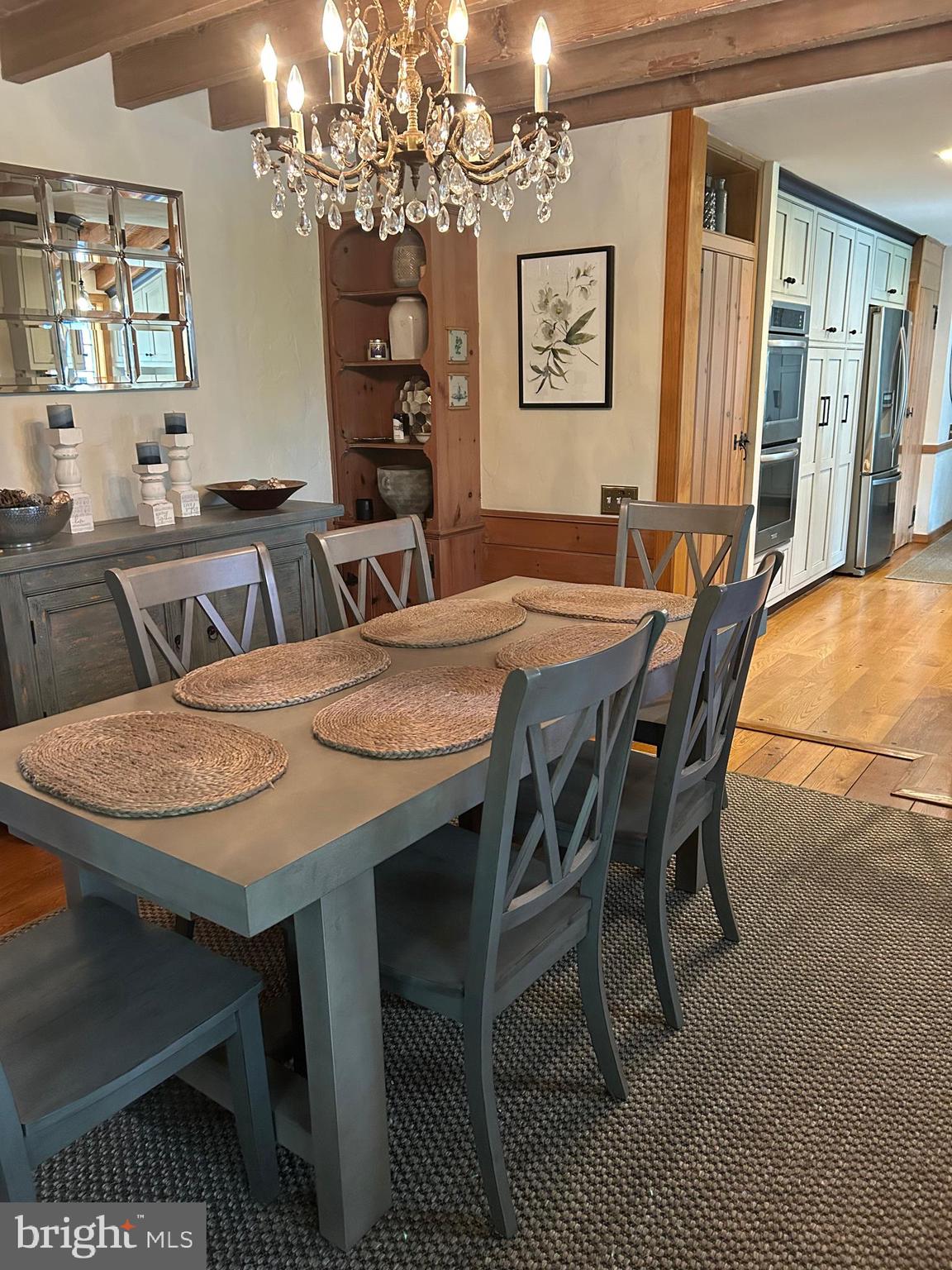 1521 Old Welsh Road Huntingdon Valley, PA 19006 - Photo 33 of 38 a view of a dining room with furniture and chandelier