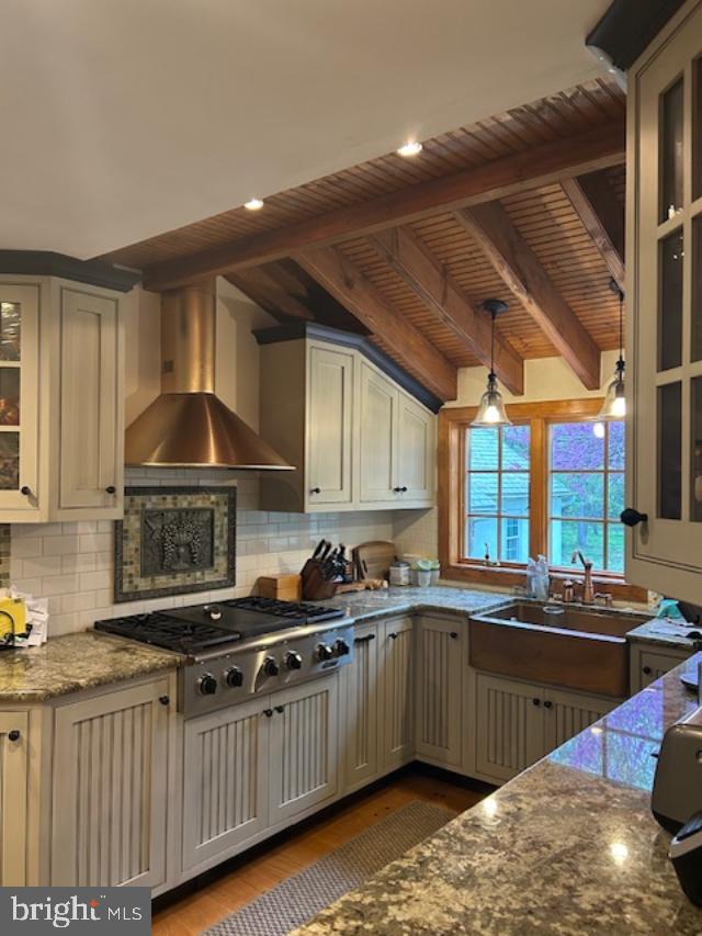 1521 Old Welsh Road Huntingdon Valley, PA 19006 - Photo 4 of 38 a kitchen with stainless steel appliances granite countertop a sink a stove and a cabinets