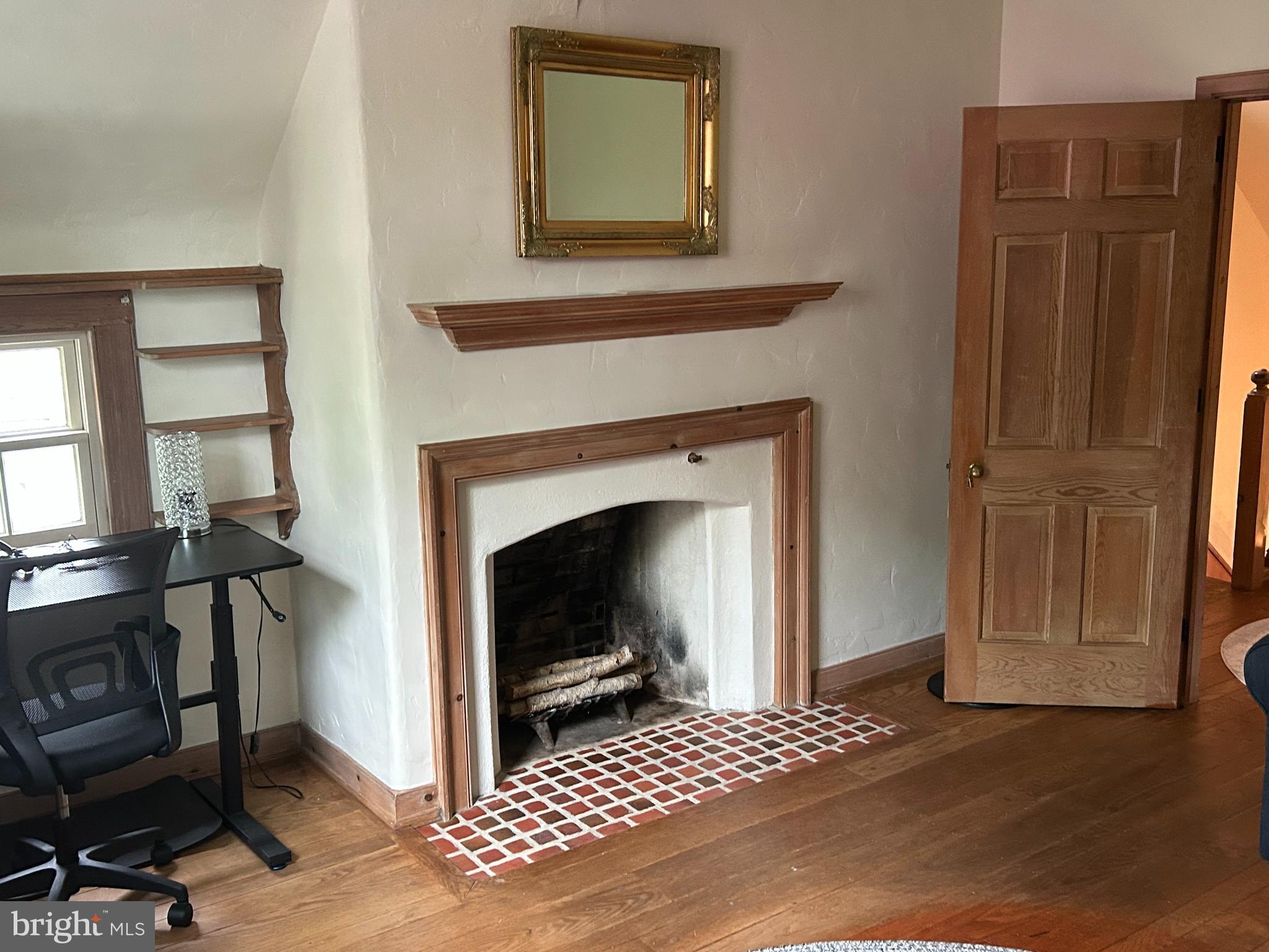 1521 Old Welsh Road Huntingdon Valley, PA 19006 - Photo 6 of 38 a view of a livingroom with furniture and a fireplace