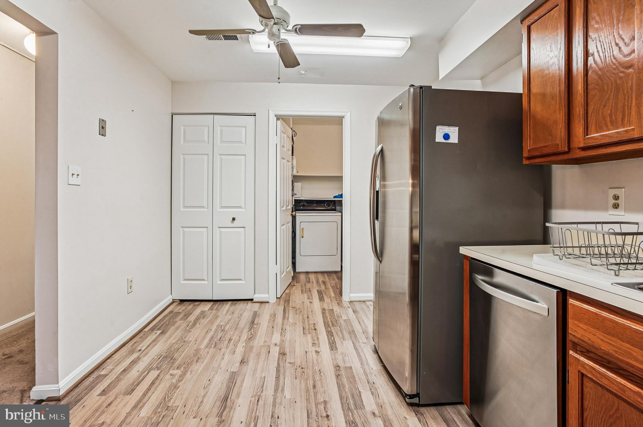 2900 Shipmaster Way, Unit 216 Annapolis, MD 21401 - Photo 15 of 53 Bi-Fold Pantry and Stainless Appliances