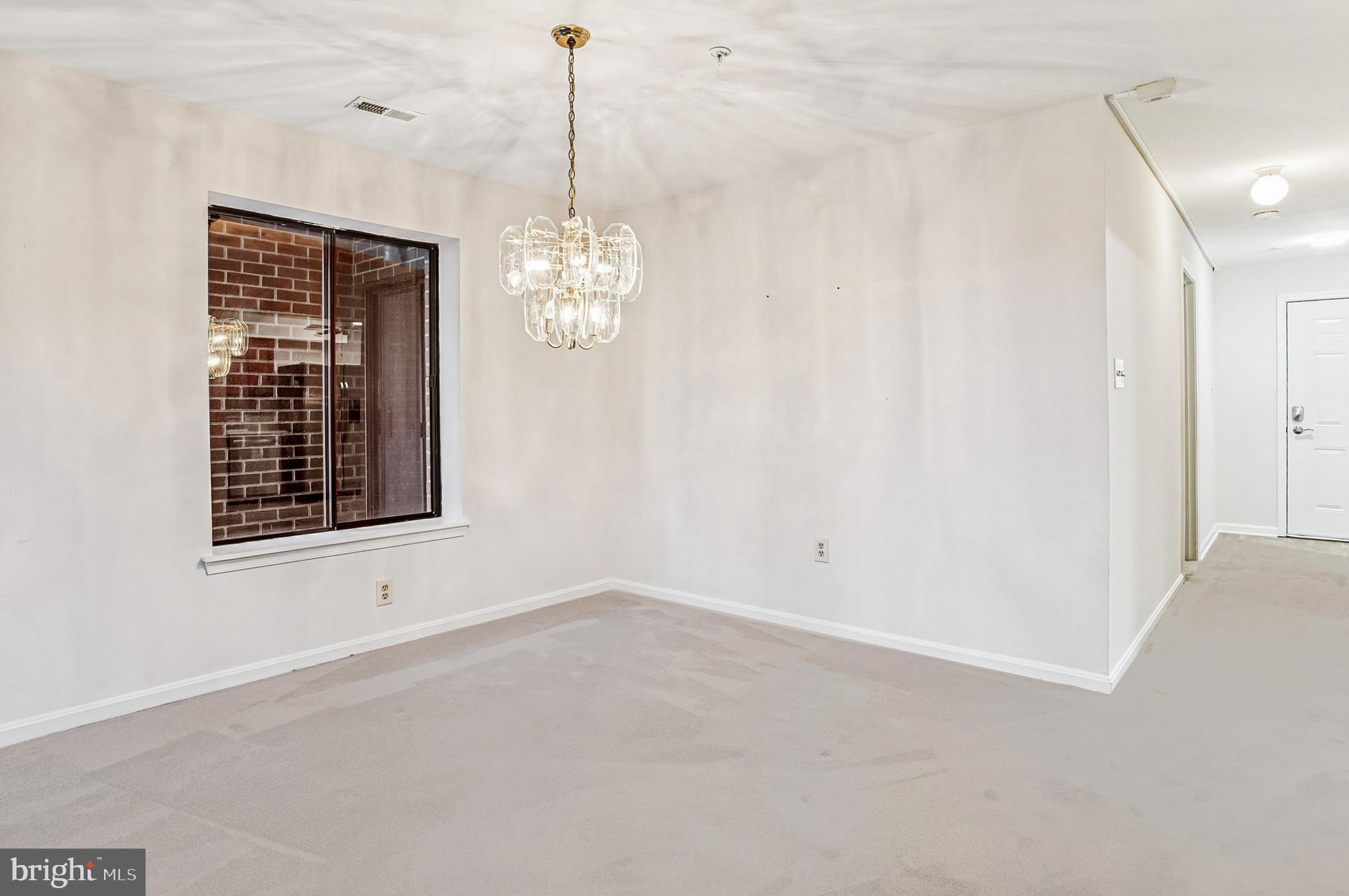 2900 Shipmaster Way, Unit 216 Annapolis, MD 21401 - Photo 20 of 53 Window Overlooking Primary BR Balcony