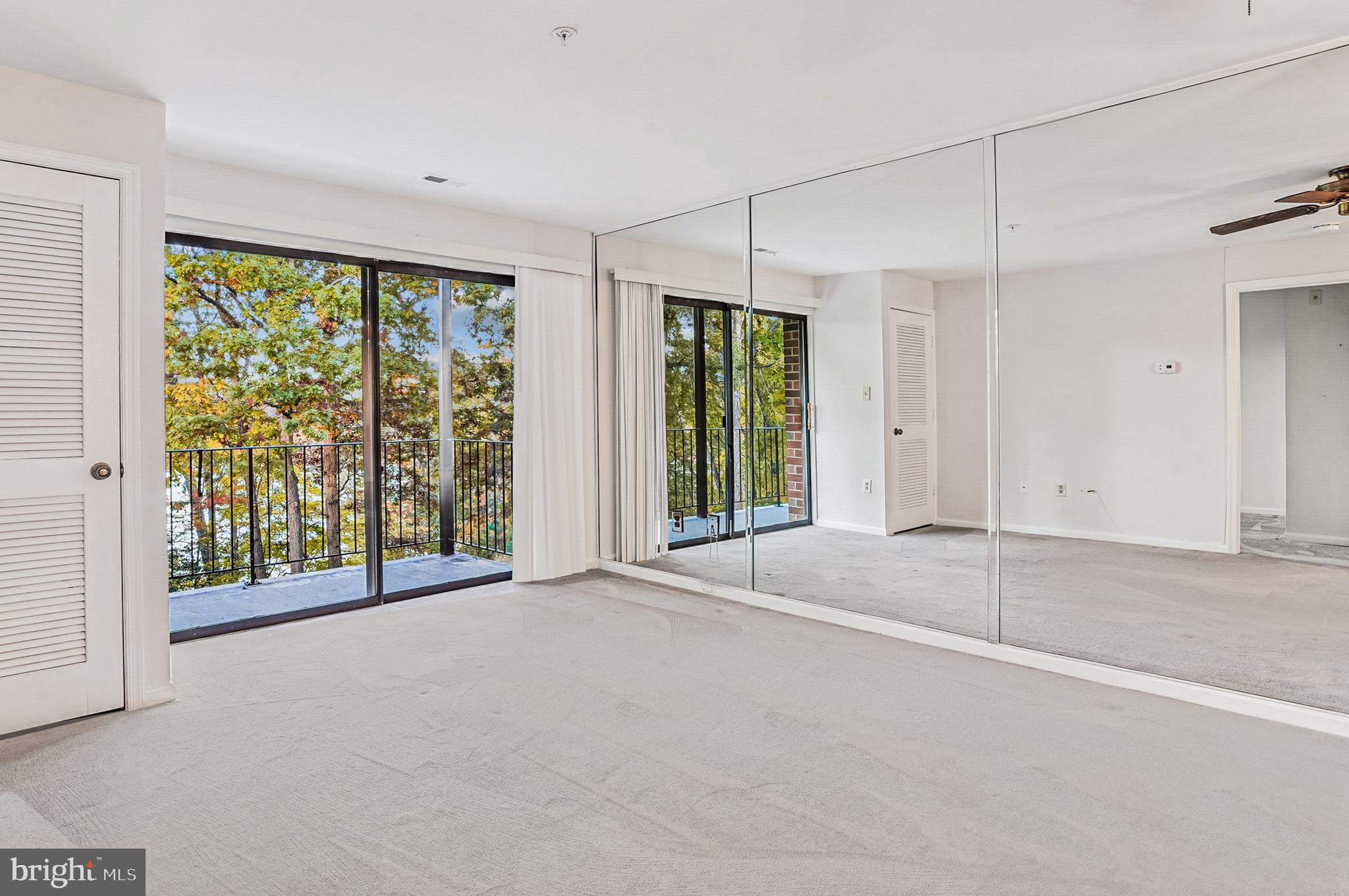 2900 Shipmaster Way, Unit 216 Annapolis, MD 21401 - Photo 22 of 53 Full Mirrored Wall Expanding Visual Space