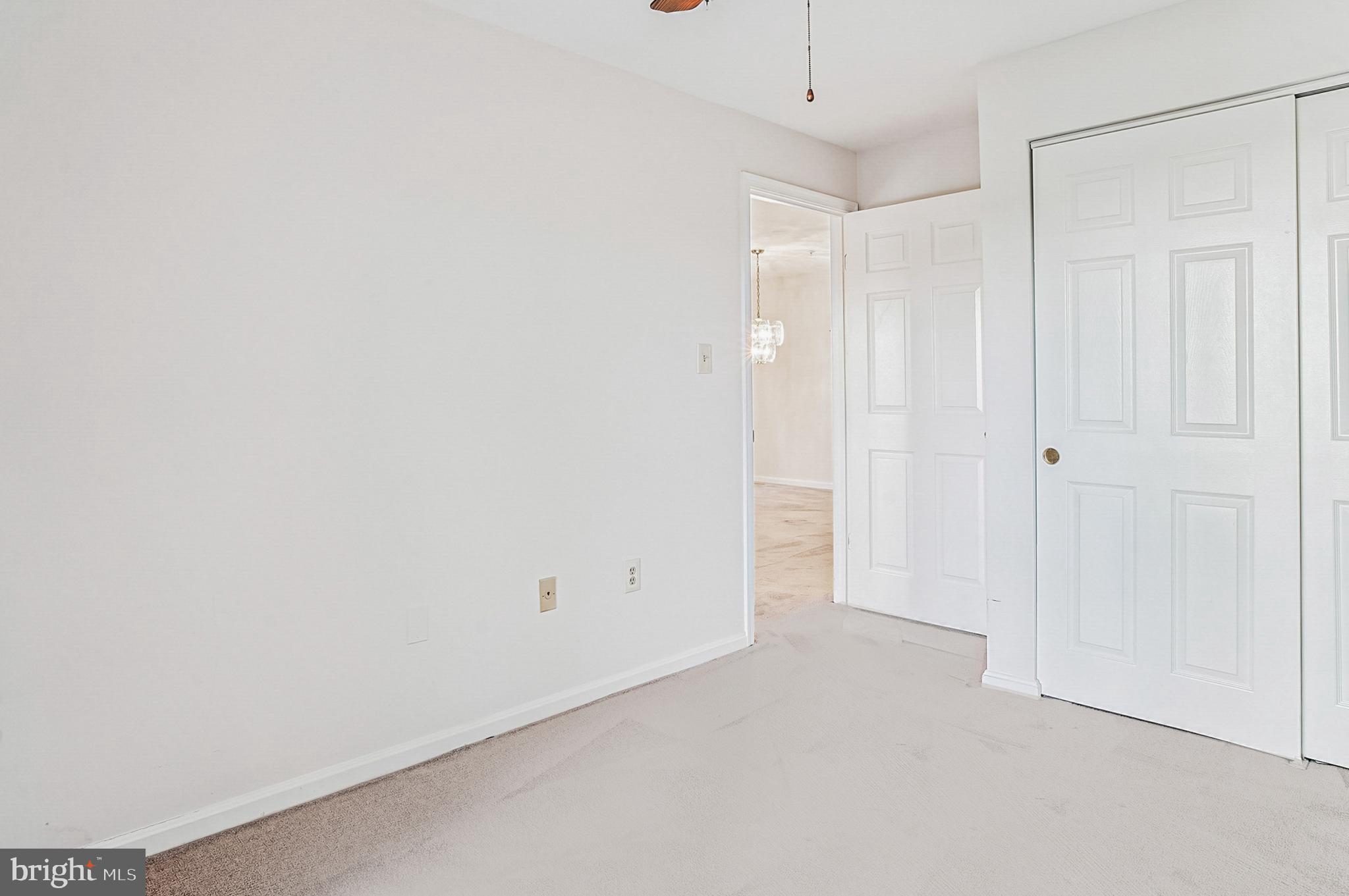 2900 Shipmaster Way, Unit 216 Annapolis, MD 21401 - Photo 30 of 53 Sizable Bedroom with Neutral Carpeting