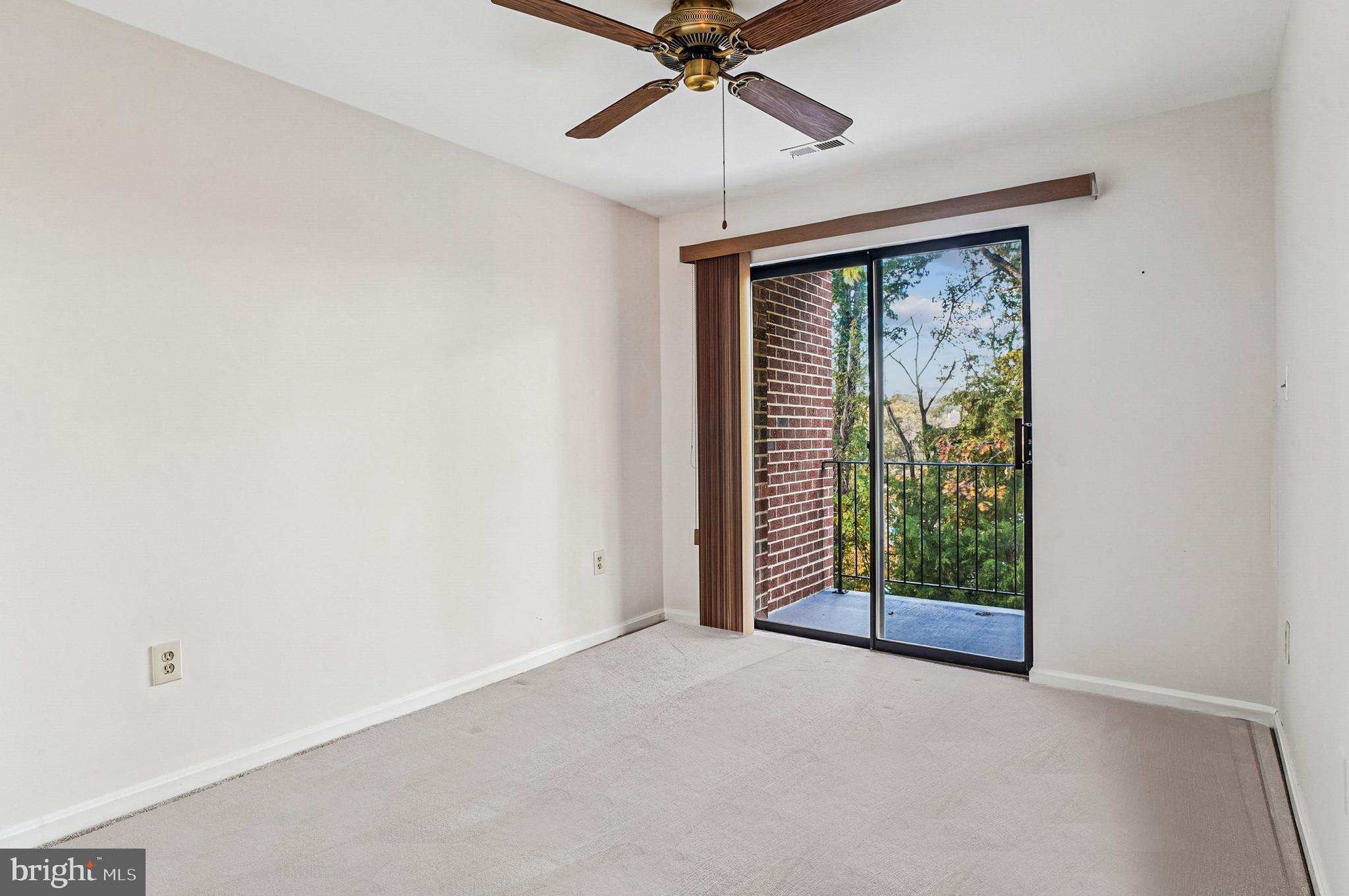 2900 Shipmaster Way, Unit 216 Annapolis, MD 21401 - Photo 32 of 53 Sliders to Rear Balcony Off Great Room