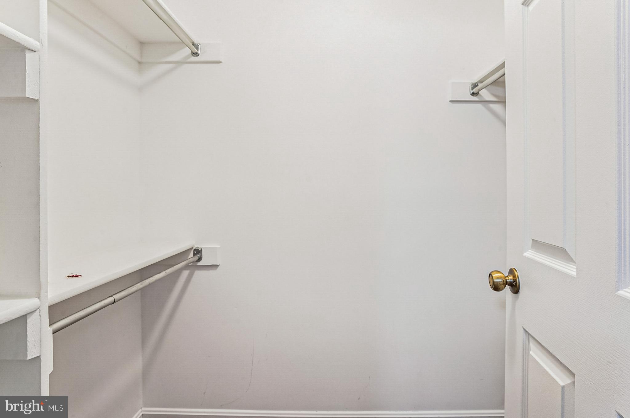 2900 Shipmaster Way, Unit 216 Annapolis, MD 21401 - Photo 41 of 53 Enviable Walk-In Closet with Shelving