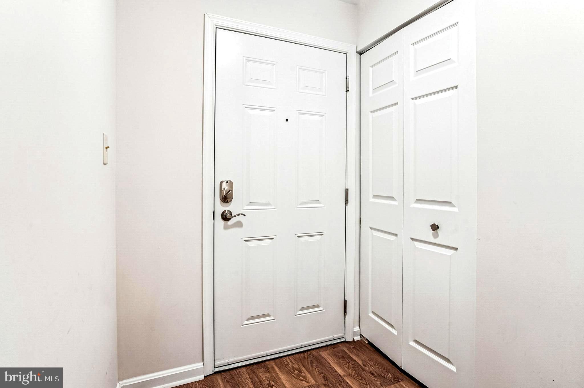 2900 Shipmaster Way, Unit 216 Annapolis, MD 21401 - Photo 10 of 53 Foyer with Oversized Coat Closet & LVP Flooring