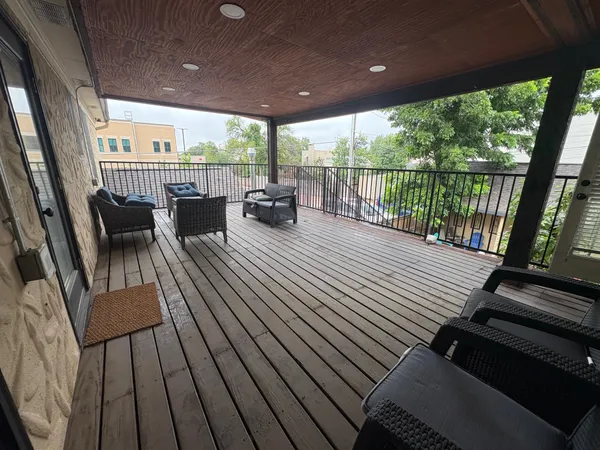 wooden floor with a balcony