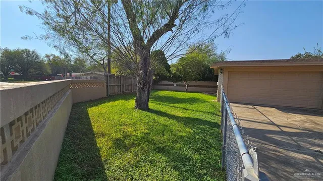 a view of a backyard with a garden