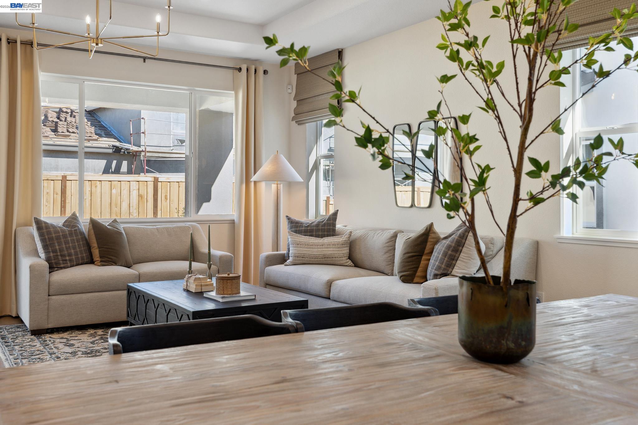1504 Millennium Way Fairfield, CA 94533 - Photo 15 of 38 a living room with furniture a table and a potted plant