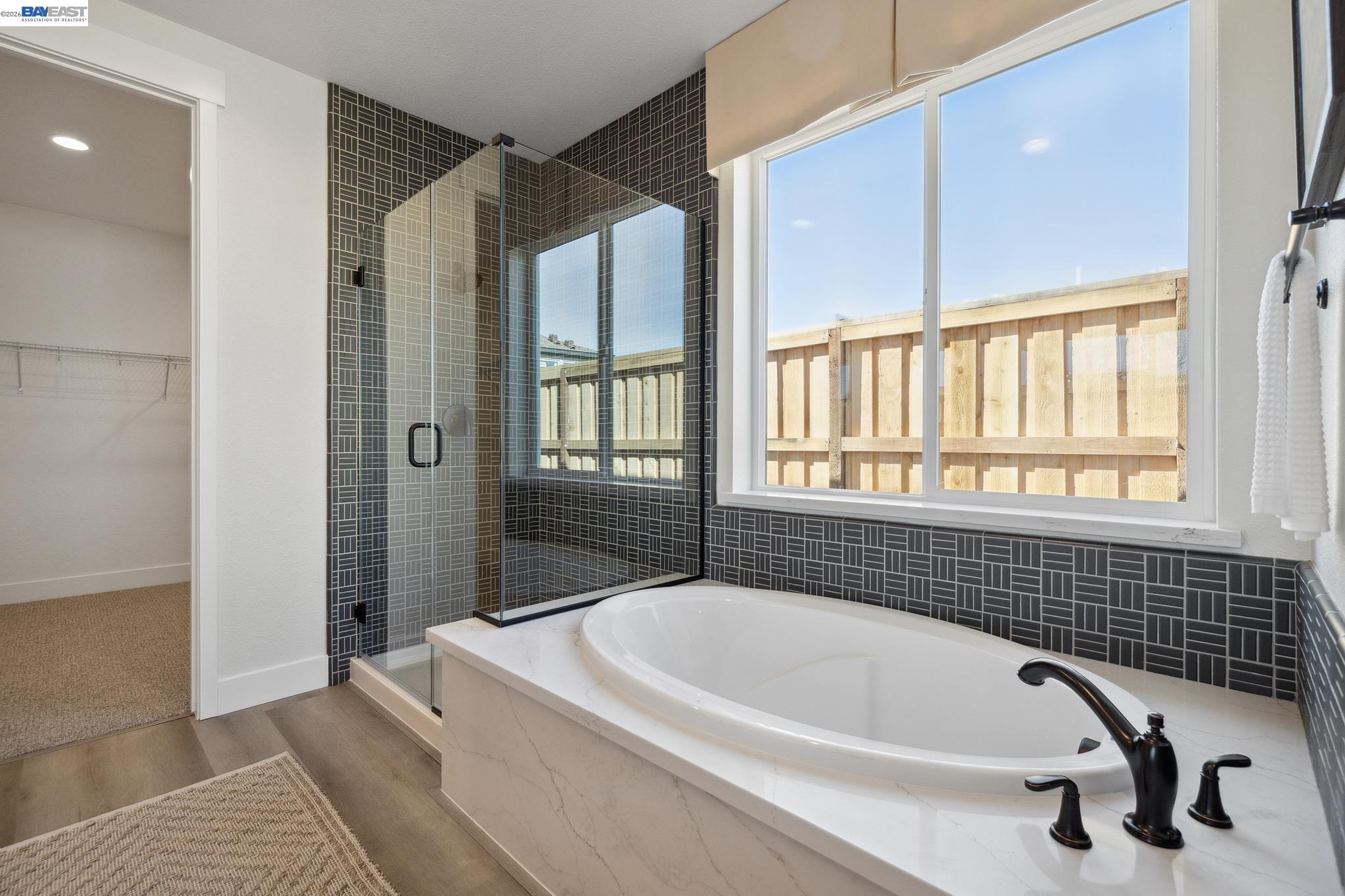 1504 Millennium Way Fairfield, CA 94533 - Photo 24 of 38 a bathroom with a bathtub and a shower