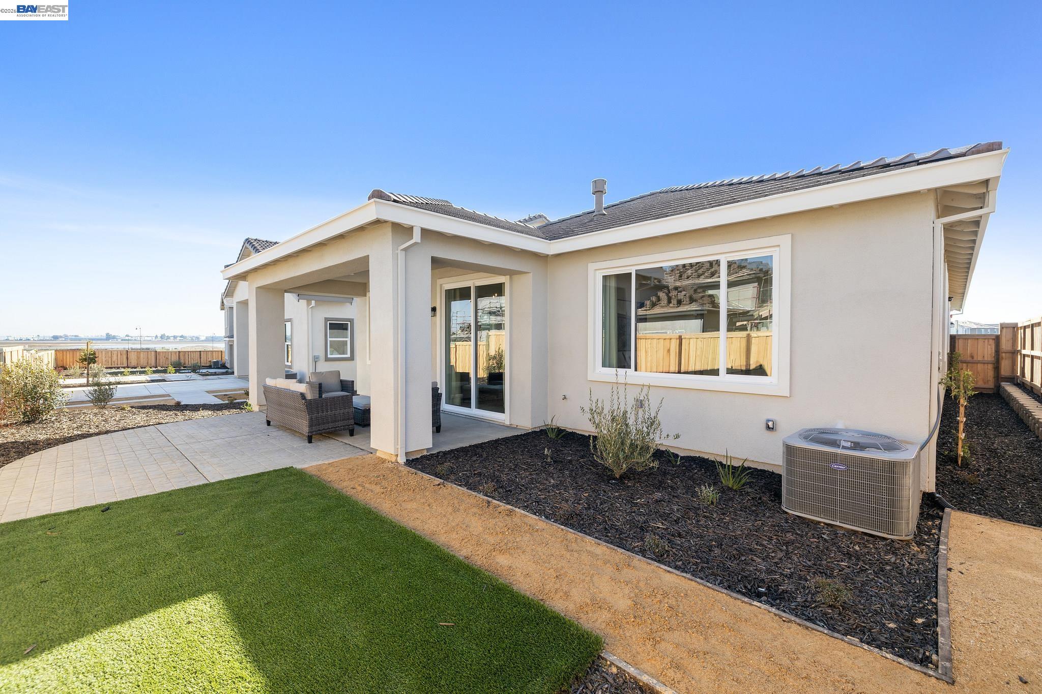 1504 Millennium Way Fairfield, CA 94533 - Photo 38 of 38 a view of a house with backyard porch and patio